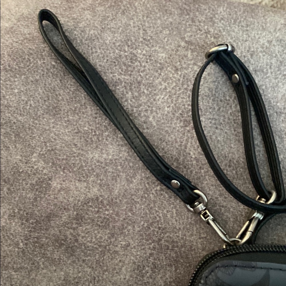 Sakroots Black Crossbody Bag with Embossed Floral Design - Picture 4 of 4